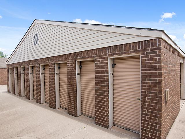 Exterior view of multiple drive-up storage units at U-Stor Self Storage in Bethany OK
