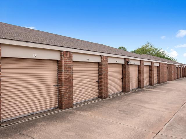 Wide lane of drive-up units with 24/7 access at U-STOR SELF STORAGE OKLAHOMA CITY, OK