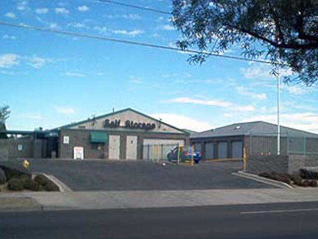 Automated gate providing secure access to a self storage facility